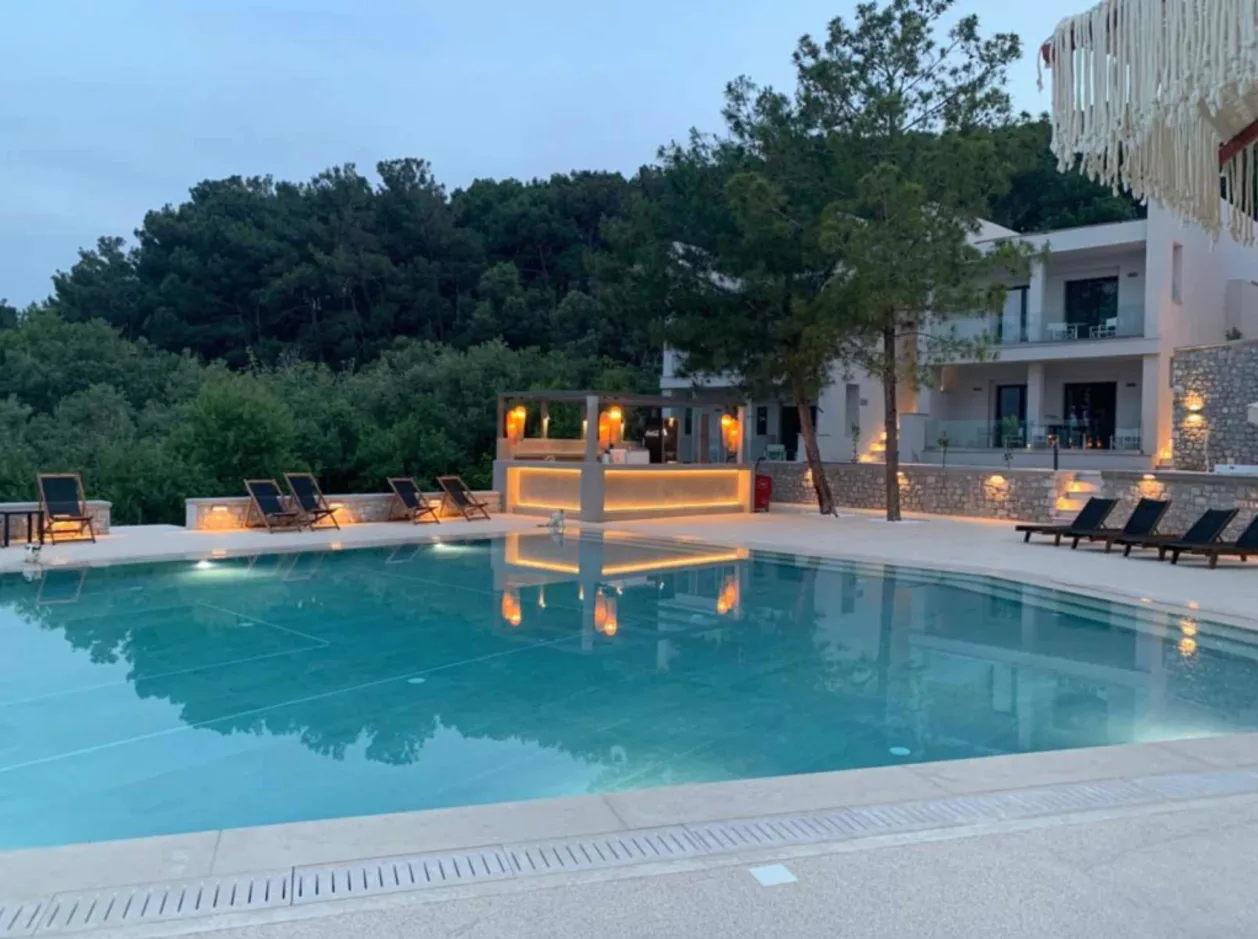 Mythical Coast Wellness Retreat pool at sunset